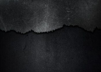 Ilustrasi tulisan anarko dan potret aksi Hari Buruh - Freepik/kjpargeter